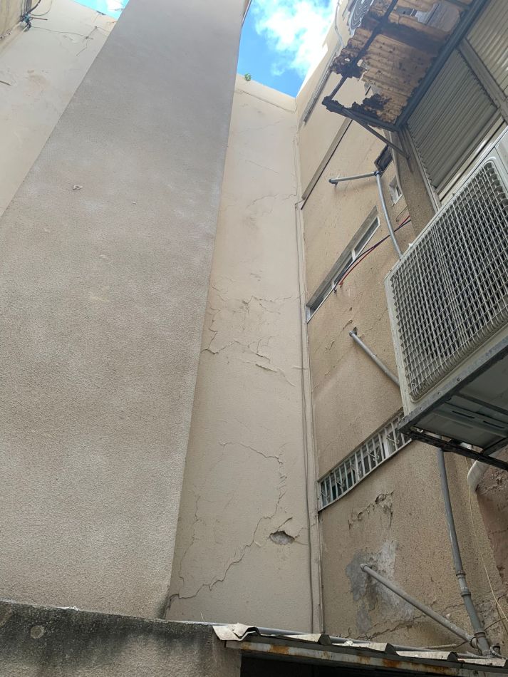 בניין הרוס קריסה צילום דוברות כבאות והצלה